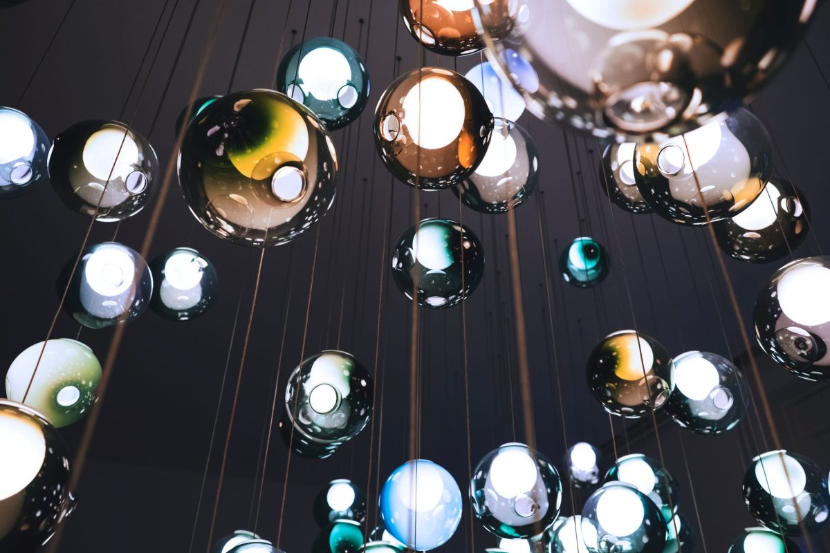 An illustrated image of decorative baubles with reflective surfaces